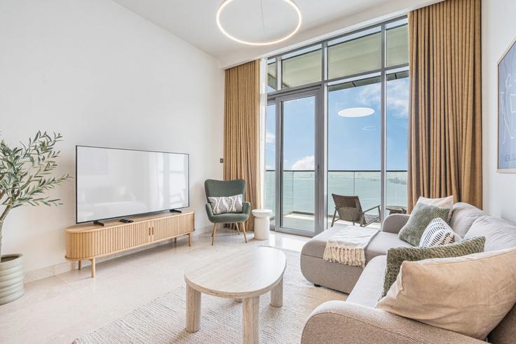 Elegante sala de estar con mobiliario moderno en un apartamento en Building Tariaq Bedon Esm - ocleyhomes-hostaway - 1254966 en Dubai Maritime City, Dubai