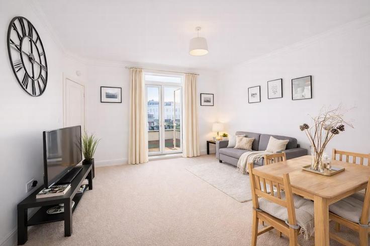 Elegant gestaltetes Wohnzimmer mit moderner Einrichtung in einer Wohnung im Building Netherwood Road - okholidays - 1473184 in London Borough of Hammersmith and Fulham, London Elegant gestaltetes Wohnzimmer mit moderner Einrichtung in einer Wohnung im Building Netherwood Road - okholidays - 1473184 in London Borough of Hammersmith and Fulham, London