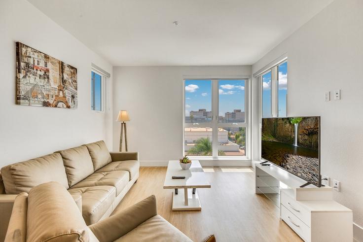 Elegante sala de estar con mobiliario moderno en un apartamento en Building North Main Street - one-lux-stay-1 - 1685865 en Los Angeles, Los Angeles Elegante sala de estar con mobiliario moderno en un apartamento en Building North Main Street - one-lux-stay-1 - 1685865 en Los Angeles, Los Angeles