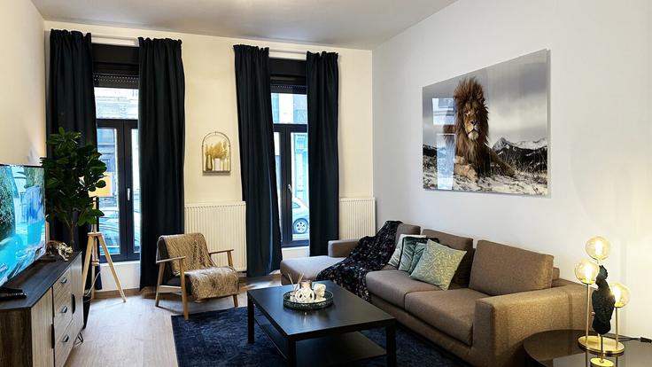 Salle de séjour élégante avec mobilier moderne dans un appartement à Building Lange Leemstraat - one-lux-stay - 1606948 à Antwerp, Antwerp Salle de séjour élégante avec mobilier moderne dans un appartement à Building Lange Leemstraat - one-lux-stay - 1606948 à Antwerp, Antwerp