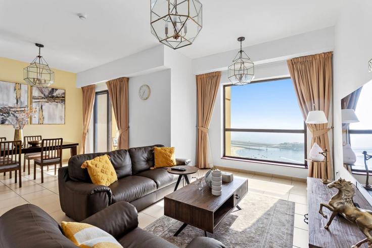 Elegantly designed living room with modern furnishings in an apartment at Building Al Gharbi Street - one-perfect-stay - 1500751 in Dubai Marina, Dubai Elegantly designed living room with modern furnishings in an apartment at Building Al Gharbi Street - one-perfect-stay - 1500751 in Dubai Marina, Dubai