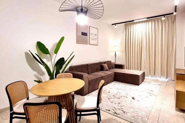 Elegantly designed living room with modern furnishings in an apartment at Building Street 9 - one-perfect-stay - 1500758 in Al Barsha South Fourth, Dubai
