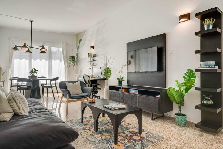 Santurce, San Juan에 위치한 Building Calle Luisa - otium-property-management-llc - 1532133 유닛의 세련된 인테리어가 돋보이는 거실 Santurce, San Juan에 위치한 Building Calle Luisa - otium-property-management-llc - 1532133 유닛의 세련된 인테리어가 돋보이는 거실