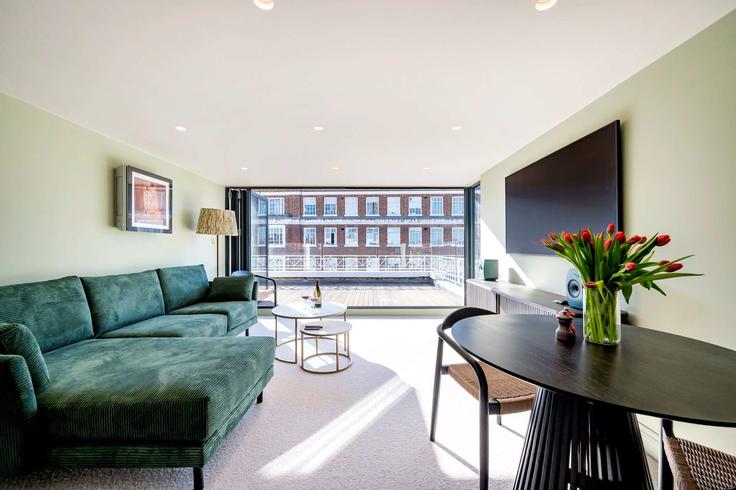 Elegante sala de estar con mobiliario moderno en un apartamento en Building Brompton Road - outofoffice - 1286416 - LON en Royal Borough of Kensington and Chelsea, London Elegante sala de estar con mobiliario moderno en un apartamento en Building Brompton Road - outofoffice - 1286416 - LON en Royal Borough of Kensington and Chelsea, London