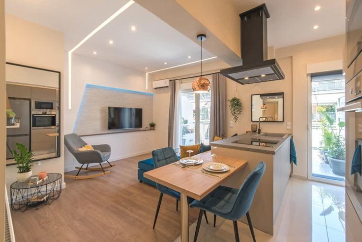 Sala de estar elegantemente projetada com móveis modernos em um apartamento no Building Ilidos - panagiotis-petropoulos - 1429767 em Central Athens, Athens