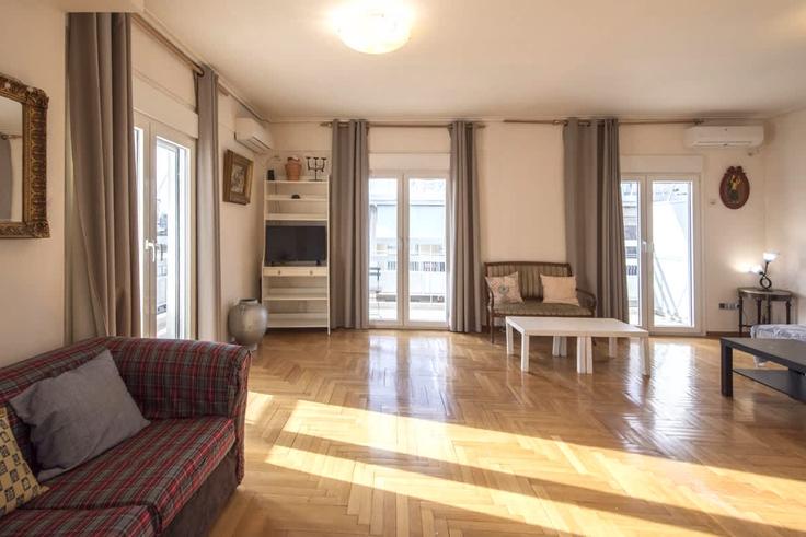 Elegantly designed living room with modern furnishings in an apartment at Building Σπυρίδωνος Τρικούπη - panagiotis-petropoulos - 1367512 in Central Athens, Athens