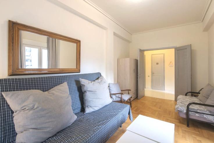 Elegantly designed living room with modern furnishings in an apartment at Building Σπυρίδωνος Τρικούπη - panagiotis-petropoulos - 1367515 in Central Athens, Athens