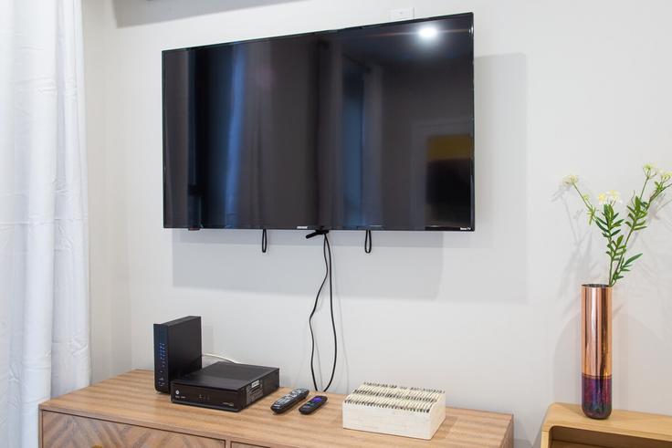 Sala de estar elegantemente projetada com móveis modernos em um apartamento no Building East 59th Street - paradisesuites - 1051317 em Manhattan, New York Sala de estar elegantemente projetada com móveis modernos em um apartamento no Building East 59th Street - paradisesuites - 1051317 em Manhattan, New York