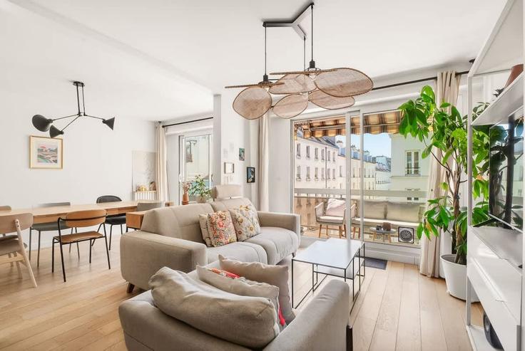 Paris 11th arrondissementのBuilding Avenue de la République - paris-conciergerie - 1533643のアパートメントにある、モダンな家具を備えたエレガントなデザインのリビングルーム