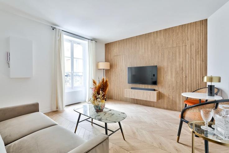 Salle de séjour élégante avec mobilier moderne dans un appartement à Building Rue Cler - paris-conciergerie - 1588589 à 7th arrondissement, Paris Salle de séjour élégante avec mobilier moderne dans un appartement à Building Rue Cler - paris-conciergerie - 1588589 à 7th arrondissement, Paris