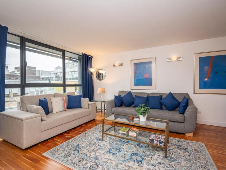 Elegantly designed living room with modern furnishings in an apartment at Building Britton Street - passthekeyss - 1255254 - LON in London Borough of Islington, London