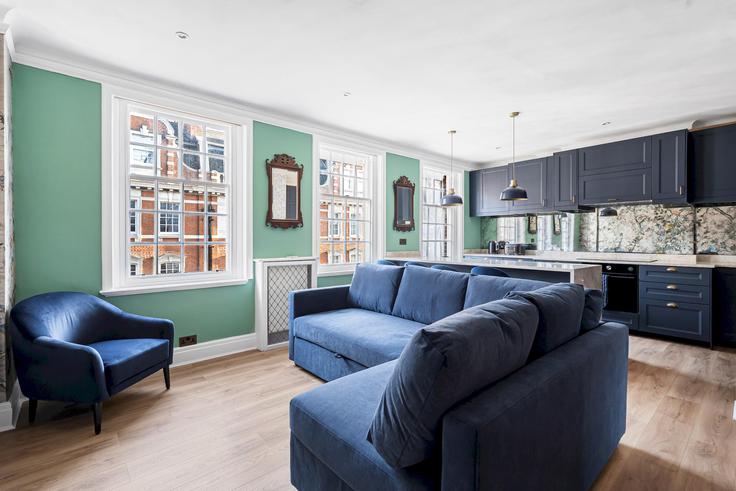 London City of WestminsterのBuilding Bentinck Street - passthekeyss - 1234018 - LONのアパートメントにある、モダンな家具を備えたエレガントなデザインのリビングルーム London City of WestminsterのBuilding Bentinck Street - passthekeyss - 1234018 - LONのアパートメントにある、モダンな家具を備えたエレガントなデザインのリビングルーム