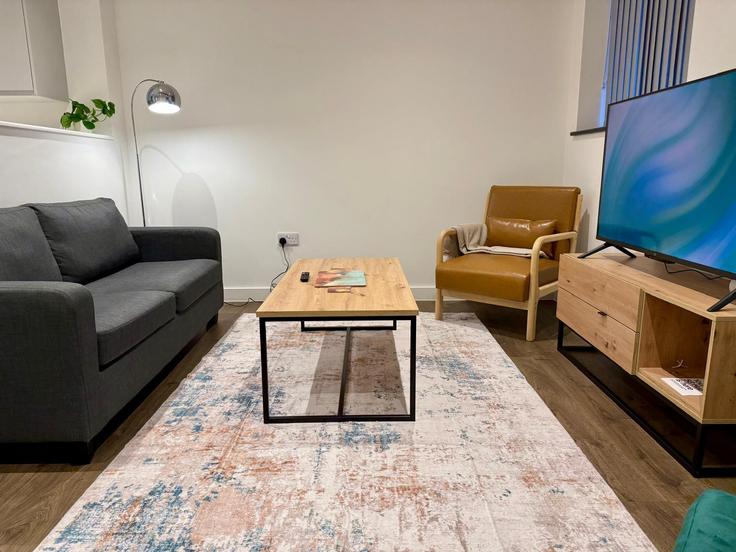 Salle de séjour élégante avec mobilier moderne dans un appartement à Building Naples Street - passthekeyss - 1355831 à Manchester, Manchester Salle de séjour élégante avec mobilier moderne dans un appartement à Building Naples Street - passthekeyss - 1355831 à Manchester, Manchester