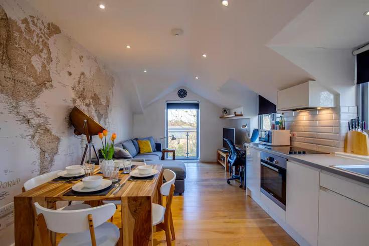 Elegante sala de estar con mobiliario moderno en un apartamento en Building Newmarket Road - passthekeyss - 1355175 en Cambridge, Cambridge Elegante sala de estar con mobiliario moderno en un apartamento en Building Newmarket Road - passthekeyss - 1355175 en Cambridge, Cambridge