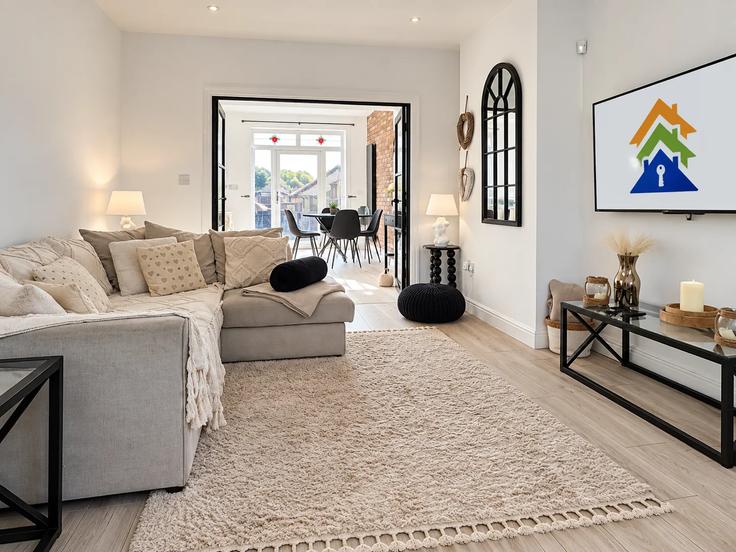 Elegant gestaltetes Wohnzimmer mit moderner Einrichtung in einer Wohnung im Building Russell Road - passthekeyss - 1641599 in City of Salford, Salford Elegant gestaltetes Wohnzimmer mit moderner Einrichtung in einer Wohnung im Building Russell Road - passthekeyss - 1641599 in City of Salford, Salford