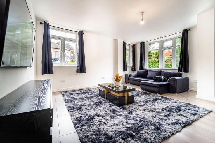 Salle de séjour élégante avec mobilier moderne dans un appartement à Building Old Bedford Road - placify - 1353811 à Luton, Luton