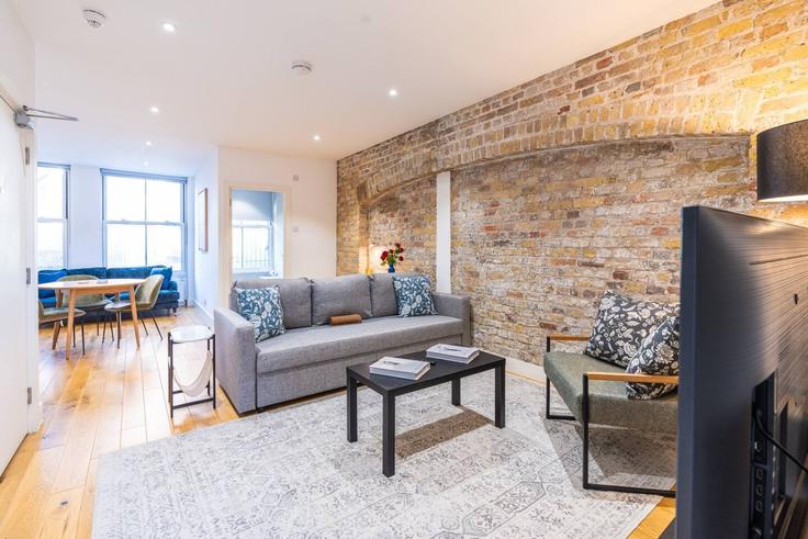 Elegant gestaltetes Wohnzimmer mit moderner Einrichtung in einer Wohnung im Building Farringdon Road - plotseeker-limited-1 - 1625431 in London Borough of Islington, London Elegant gestaltetes Wohnzimmer mit moderner Einrichtung in einer Wohnung im Building Farringdon Road - plotseeker-limited-1 - 1625431 in London Borough of Islington, London