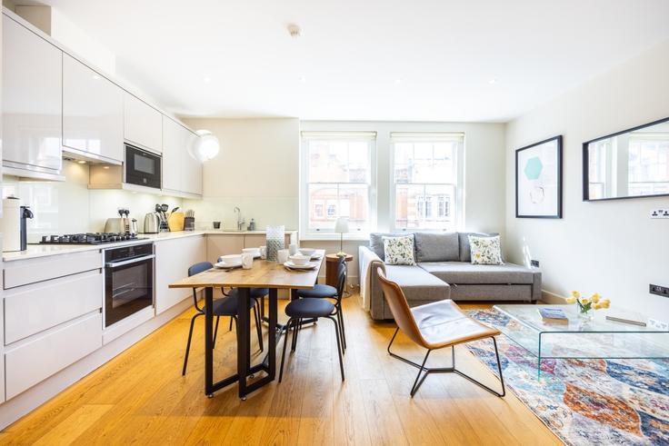 Elegante sala de estar con mobiliario moderno en un apartamento en Building Great Titchfield Street - plotseeker-limited-1 - 1625447 en City of Westminster, London