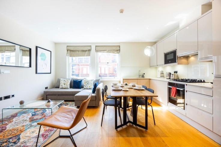 Elegante sala de estar con mobiliario moderno en un apartamento en Building Great Titchfield Street - plotseeker-limited-1 - 1625471 en City of Westminster, London