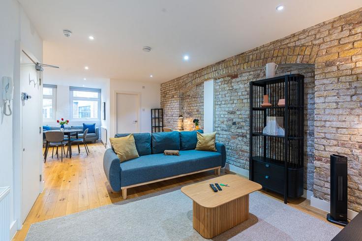 London London Borough of IslingtonのBuilding Farringdon Road - plotseeker - 1365682のアパートメントにある、モダンな家具を備えたエレガントなデザインのリビングルーム London London Borough of IslingtonのBuilding Farringdon Road - plotseeker - 1365682のアパートメントにある、モダンな家具を備えたエレガントなデザインのリビングルーム