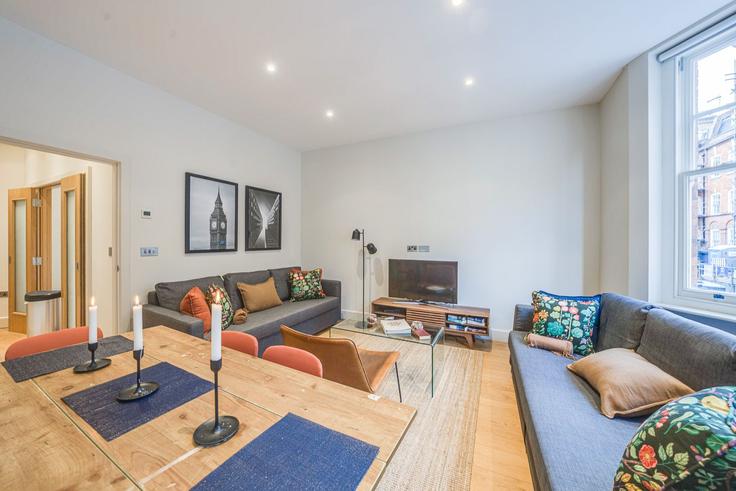 Elegantly designed living room with modern furnishings in an apartment at Building Great Titchfield Street - plotseeker - 1570216 in City of Westminster, London