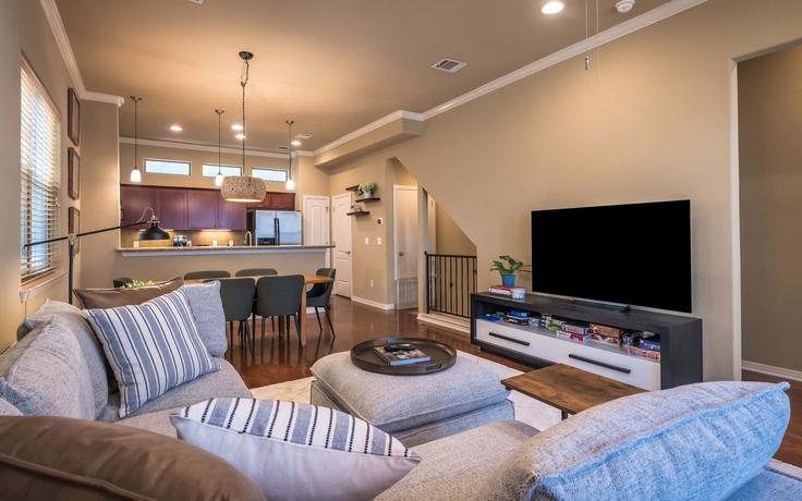Elegantly designed living room with modern furnishings in an apartment at Building Kinney Avenue - pmiatxproperties - 1292406 - ATX in Austin, Austin Elegantly designed living room with modern furnishings in an apartment at Building Kinney Avenue - pmiatxproperties - 1292406 - ATX in Austin, Austin