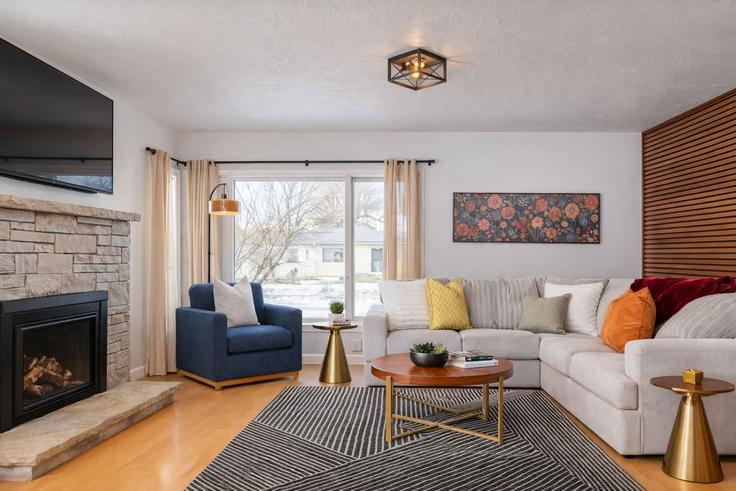Elegantly designed living room with modern furnishings in an apartment at Building North Reserve Avenue - powerhouseproperties920 - 1374252 in Fond du Lac, Fond du Lac