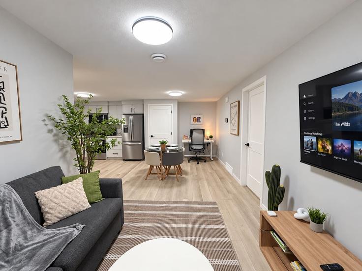 Elegante sala de estar con mobiliario moderno en un apartamento en Building Rochester Terrace Northwest - premier-stays - 1665909 en Calgary, Calgary Elegante sala de estar con mobiliario moderno en un apartamento en Building Rochester Terrace Northwest - premier-stays - 1665909 en Calgary, Calgary