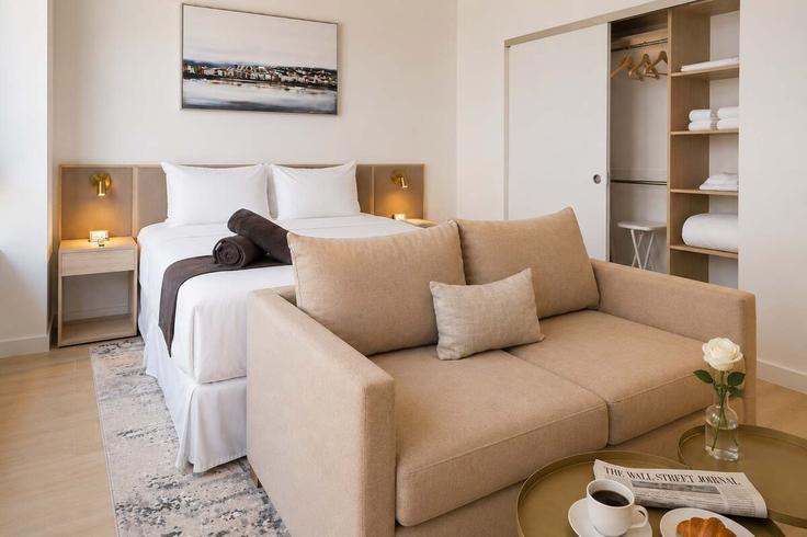 Miami, Miami에 위치한 Building North Miami Avenue - premier-suites-management-llc - 1541673 유닛의 세련된 인테리어가 돋보이는 거실 Miami, Miami에 위치한 Building North Miami Avenue - premier-suites-management-llc - 1541673 유닛의 세련된 인테리어가 돋보이는 거실