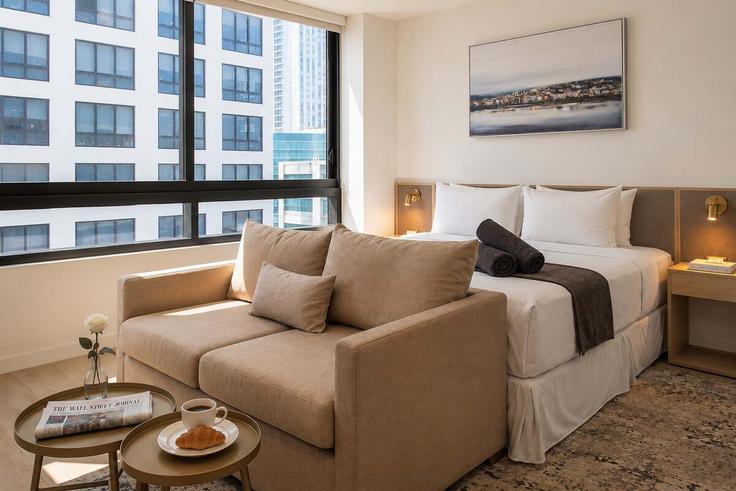 Miami MiamiのBuilding North Miami Avenue - premier-suites-management-llc - 1541673のアパートメントにある、モダンな家具を備えたエレガントなデザインのリビングルーム Miami MiamiのBuilding North Miami Avenue - premier-suites-management-llc - 1541673のアパートメントにある、モダンな家具を備えたエレガントなデザインのリビングルーム