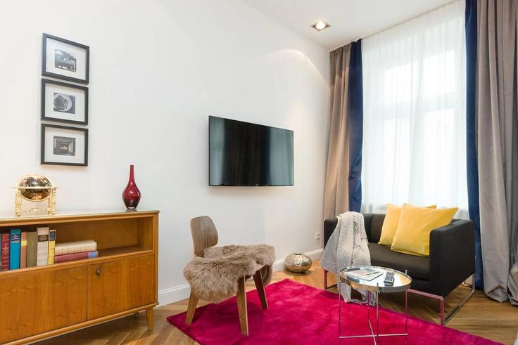 Elegant gestaltetes Wohnzimmer mit moderner Einrichtung in einer Wohnung im Building Alser Straße - prestige-apartments - 1383562 in Vienna, Vienna Elegant gestaltetes Wohnzimmer mit moderner Einrichtung in einer Wohnung im Building Alser Straße - prestige-apartments - 1383562 in Vienna, Vienna