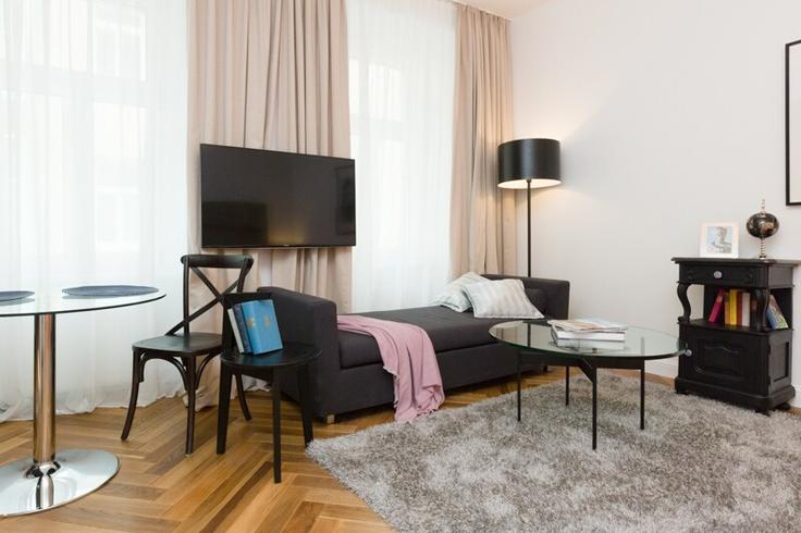 Salle de séjour élégante avec mobilier moderne dans un appartement à Building Vierthalergasse - prestige-apartments - 1227762 à Vienna, Vienna