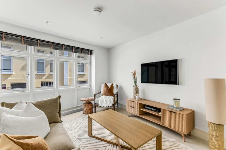 Elegante sala de estar con mobiliario moderno en un apartamento en Building Pottery Lane - prime-sa - 1496953 en Royal Borough of Kensington and Chelsea, London Elegante sala de estar con mobiliario moderno en un apartamento en Building Pottery Lane - prime-sa - 1496953 en Royal Borough of Kensington and Chelsea, London