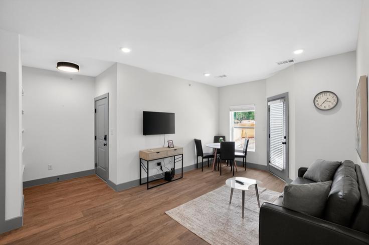 Elegantly designed living room with modern furnishings in an apartment at Building Wickersham Lane - properties-by-preston-1 - 1613060 in Austin, Austin