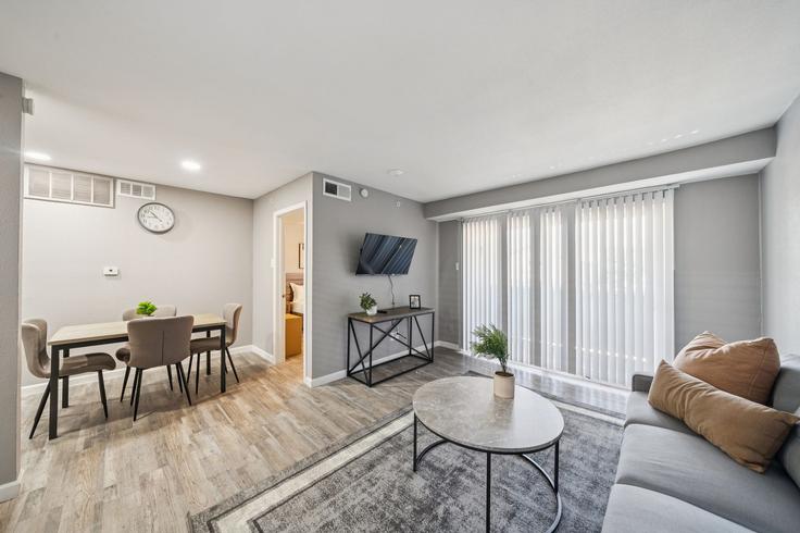 Elegantly designed living room with modern furnishings in an apartment at Building Esperanza Road - properties-by-preston-1 - 1613341 in Dallas, Dallas
