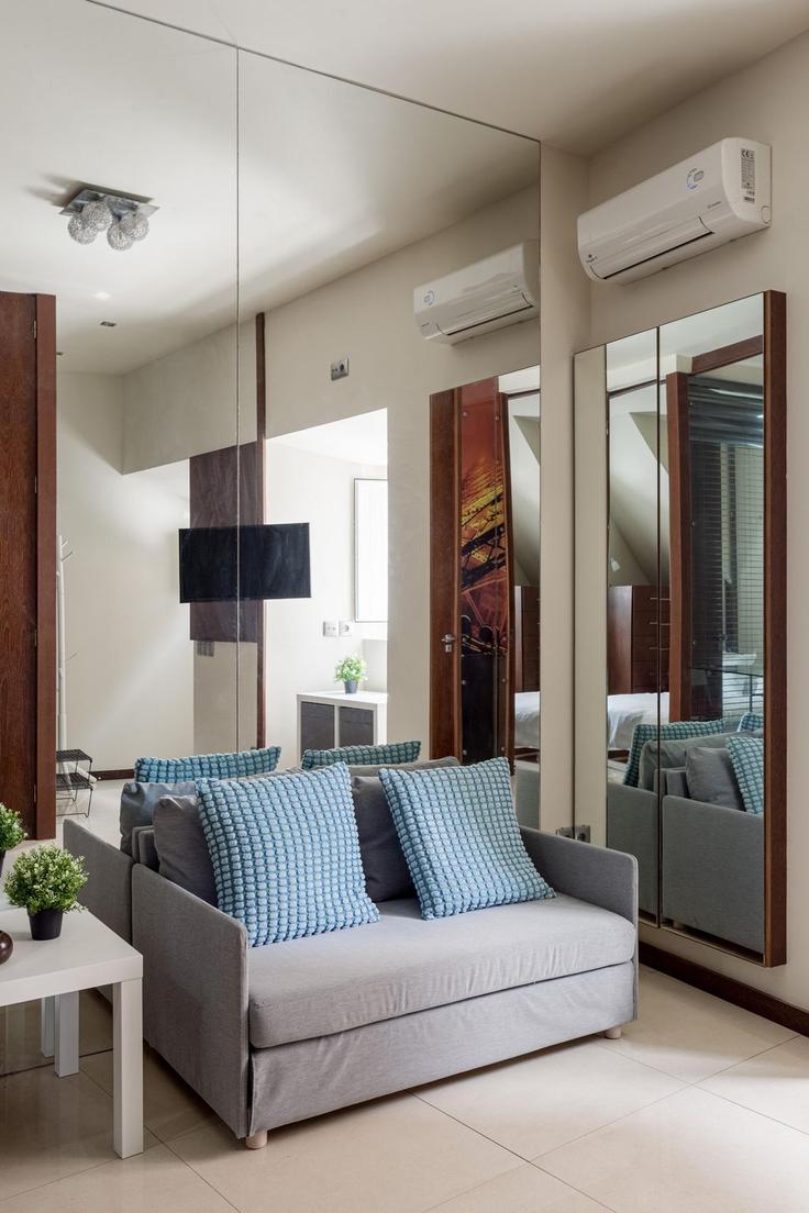 Sala de estar elegantemente projetada com móveis modernos em um apartamento no Building Rua Gonçalves Zarco - propr - 1344930 em Belém, Lisbon Sala de estar elegantemente projetada com móveis modernos em um apartamento no Building Rua Gonçalves Zarco - propr - 1344930 em Belém, Lisbon