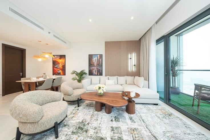 Elegant gestaltetes Wohnzimmer mit moderner Einrichtung in einer Wohnung im Building Tariaq Bedon Esm - pvh-vacation-homes - 1471414 in Nad Al Sheba, Dubai Elegant gestaltetes Wohnzimmer mit moderner Einrichtung in einer Wohnung im Building Tariaq Bedon Esm - pvh-vacation-homes - 1471414 in Nad Al Sheba, Dubai