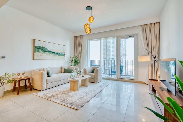 Elegantly designed living room with modern furnishings in an apartment at Building Tariaq Bedon Esm - pvh-vacation-homes - 1490119 in Al Kheeran First, Dubai