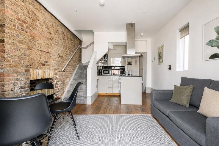 London Royal Borough of Kensington and ChelseaのBuilding 29 Collingham Place - pvl-properties-ltd-1 - 1697585のアパートメントにある、モダンな家具を備えたエレガントなデザインのリビングルーム London Royal Borough of Kensington and ChelseaのBuilding 29 Collingham Place - pvl-properties-ltd-1 - 1697585のアパートメントにある、モダンな家具を備えたエレガントなデザインのリビングルーム