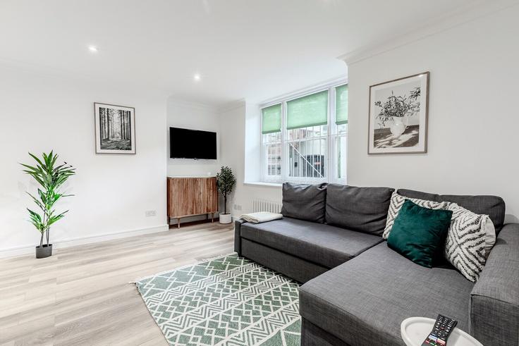 Elegante sala de estar con mobiliario moderno en un apartamento en Building Conduit Mews - pvl-properties-ltd - 1516024 en City of Westminster, London Elegante sala de estar con mobiliario moderno en un apartamento en Building Conduit Mews - pvl-properties-ltd - 1516024 en City of Westminster, London