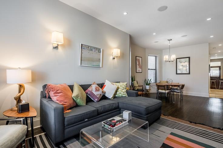 Elegantly designed living room with modern furnishings in an apartment at Building West Logan Boulevard - redawning - 1255600 - CHI in Chicago, Chicago