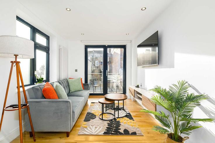 Salle de séjour élégante avec mobilier moderne dans un appartement à Building Hoxton Street - reddy-properties-limited-1 - 1640192 à London Borough of Hackney, London Salle de séjour élégante avec mobilier moderne dans un appartement à Building Hoxton Street - reddy-properties-limited-1 - 1640192 à London Borough of Hackney, London