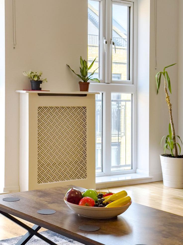 Elegante sala de estar con mobiliario moderno en un apartamento en Building Pitfield Street - reddy-properties-limited - 1380889 en London Borough of Islington, London Elegante sala de estar con mobiliario moderno en un apartamento en Building Pitfield Street - reddy-properties-limited - 1380889 en London Borough of Islington, London