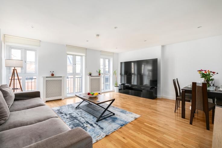 London London Borough of IslingtonのBuilding Pitfield Street - reddy-properties-limited - 1380889のアパートメントにある、モダンな家具を備えたエレガントなデザインのリビングルーム London London Borough of IslingtonのBuilding Pitfield Street - reddy-properties-limited - 1380889のアパートメントにある、モダンな家具を備えたエレガントなデザインのリビングルーム