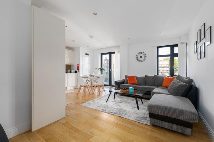 Elegantly designed living room with modern furnishings in an apartment at Building Hoxton Street - reddy-properties-limited - 1380893 in London Borough of Hackney, London