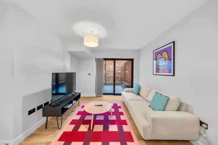 Elegantly designed living room with modern furnishings in an apartment at Building Amity Grove - redwood-living - 1467135 in London Borough of Merton, London