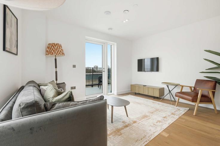 Sala de estar elegantemente projetada com móveis modernos em um apartamento no Building White Horse Road - redwood-living - 1512356 em London Borough of Tower Hamlets, London