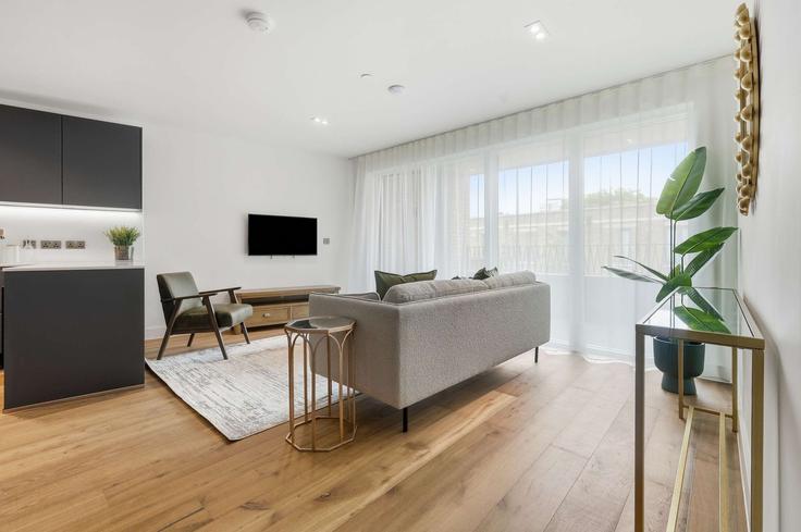 Salle de séjour élégante avec mobilier moderne dans un appartement à Building White Horse Road - redwood-living - 1646060 à London Borough of Tower Hamlets, London