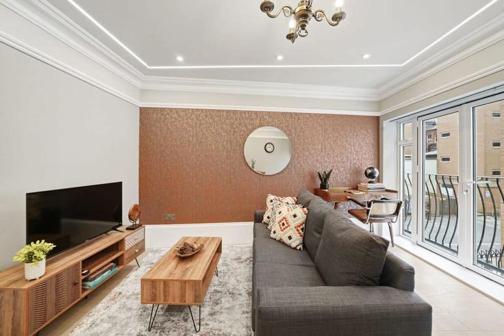 Elegante sala de estar con mobiliario moderno en un apartamento en Building The Forbury - redwood-stays-limited - 1303733 - LON en Reading, Reading