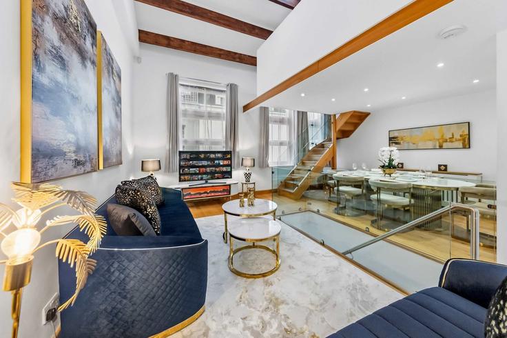 Elegantly designed living room with modern furnishings in an apartment at Building Ovington Mews - regal-realms - 1591588 in Royal Borough of Kensington and Chelsea, London
